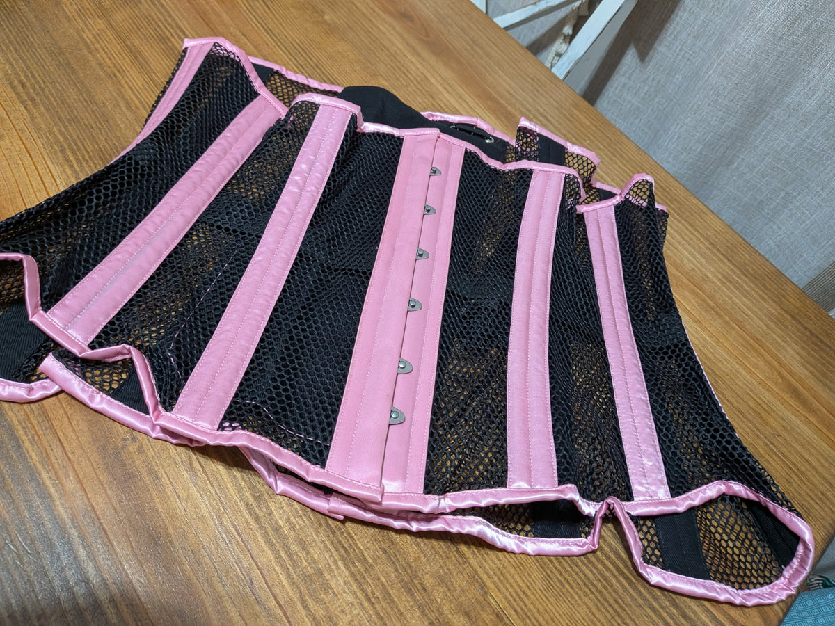 Light pink satin and mesh corset