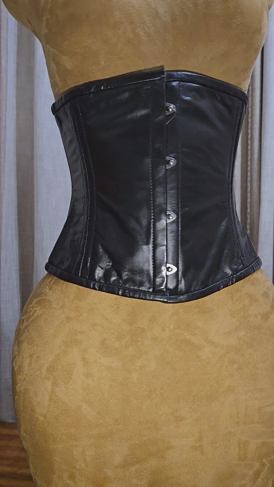 26-inch waist goal | 10-inch length | Black leather corset